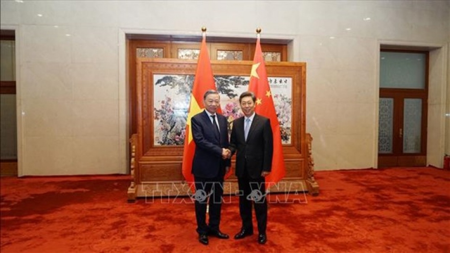 Public security minister To Lam meets Chinese officials in China